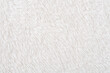white plush fabric texture background, background pattern of soft warm material
