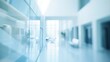 © Generative AI - Blurred hotel or office building lobby blur background interior view toward reception hall modern luxury white room space with blurry corridor and building glass wall window : Generative AI