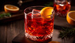 Negroni sbagliato cocktail, prosecco with Campari and vermouth. Serve in a highball glass with an orange slice