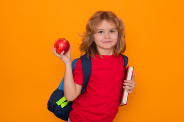 Aufkleber - School child with book isolated on yellow background. Elementary school. Pupil go study. Clever schoolboy learning. Kids study, knowledge and education concept.