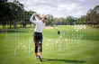 Double exposure professional woman golfer teeing to hole in player tournament competition at golf course for winner with infographic invest stock is sport and business concept.