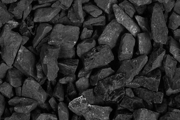 Wall Mural - Coal. black crushed stone background texture close-up. rubble in a heap.