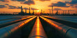 Pipelines at oil refinery with bright sunset