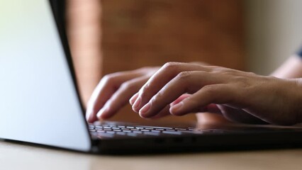 Canvas Print - Closeup of hands typing on laptop keyboard