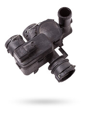 Poster - Heating system valve made of black plastic on a white isolated background in a photo studio. A unit of a liquid cooling system. Used spare parts from junkyard catalog.