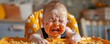 Emotional Mealtime: Baby Crying with Orange Pasta Sauce Covered Face in High Chair