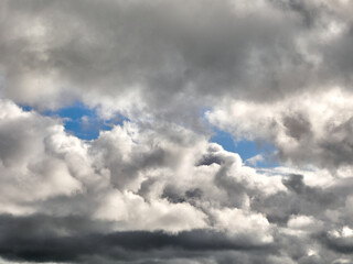 white fluffy clouds in the deep blue sky. heaven background