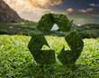 Recycling green symbol made of gren grass and leaves. Ecological zero waste concept