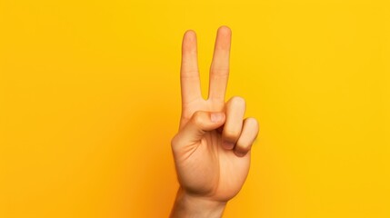 Poster - A person making a peace sign gesture. Suitable for various concepts