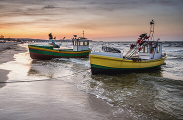 Canvas Print - Fishing boats on Baltic Sea beach in Karlikowo District in Sopot city, Poland