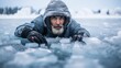 © javier - Winter gear clad ice fisherman frozen lake hole vast cold landscape