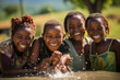 © erika8213 - Joyful african children playing with water