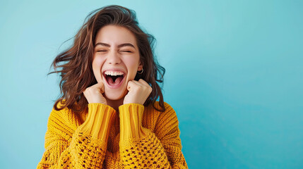 Happy Screaming young woman on pastel blue background.  Joy vibe