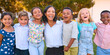 © Monkey Business - Portrait Of Female Primary Or Elementary School Teacher With Multi-Cultural Class Outdoors