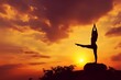 Silhouette of a yogi in Lord of the Dance Pose against a vibrant sunset sky