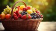 Assorted fresh fruit and berries in basket with copy space on blurred outdoor background