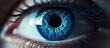 A closeup shot capturing the beauty of a womans azure eye with long eyelashes and electric blue eye shadow. An artful depiction of the human bodys intricate nerve system