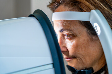 Mature woman receiving an innovative a laser treatment for glaucoma