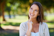 © Duncan/peopleimages.com - Thinking, sunshine and outdoor with woman, smile and ideas with decision and problem solving. Person, fresh air and girl in a park, happiness and choice with solution and options with weekend break