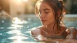Enjoying suntan and vacation. Outdoor portrait of pretty young woman in swimming pool