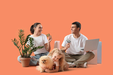 Sticker - Happy family with credit cards shopping online on orange background