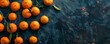 Vibrant mandarins on a textured dark background