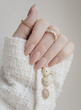 Classic beige manicure. Stylish nude manicure. Nail polish. Matte nails. Female hands manicure close up