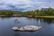 © AmazingAerialAgency - Aerial view of calm, clear Vuoksi River with beautiful bird's eye view perspective, Karelia, Russia.