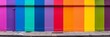 Full frame image of colorful lgbt flag painted wall in vibrant palette style, pride banner design