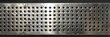 Perforated metal panel with perforated holes in the form of a dot grid
