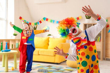 Poster - Funny little boy in clown costume at home. April Fools' Day celebration