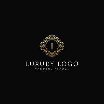 Luxurious elegant victorian floral filigree frame badge pattern with Initial letters I inside  circle badge emblem logo design vector in gold colors