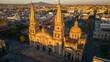 Aerial Drone Fly Above Guadalajara Mexico Church landmark Travel City historic center, Roman Catholic Building Architecture in Sunset around local traditional houses	