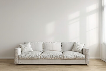 Wall Mural - A white couch sits in a room with a white wall