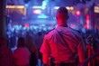 © Anastasiia - Nightclub security guard keeping partygoers safe with attentive watchful presence. Concept Nightclub Security, Crowd Control, Safety Measures, Security Guard Duties, Nightlife Protection