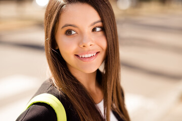 Sticker - Portrait of adorable stylish cute girl with brunette hairstyle wear school uniform bag on shoulder cross road on city street outdoors