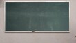 © Dashen - 3D render of a blank green chalkboard in a classroom