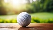 Close-up of golf player putting ball into hole on defocused background with space for text