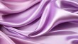 Luxurious smooth lilac satin or silk fabric texture background for design and textile concepts