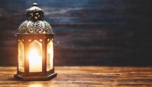 Beautiful Burning Arabic Lantern On Wooden Table Ramadan Background With Copy Space For Text
