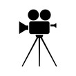 © far700 - Old film movie camera icon. Black silhouette. Front side view. Vector simple flat graphic illustration. Isolated object on a white background. Isolate.