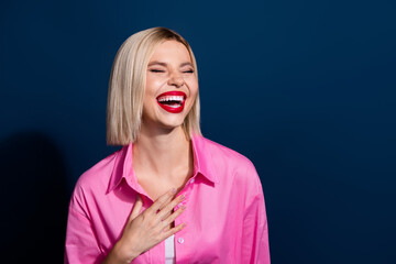 Sticker - Photo of good mood adorable girl with bob hairstyle red lipstick dressed pink shirt laughing isolated on dark blue color background