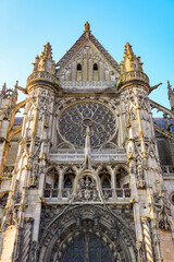 Wall Mural - Rose window on the transept of the early-gothic Senlis Cathedral in the capital of Oise in Picardy, North of France