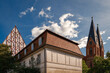 Westfront der ehemaligen Franziskaner-Klosterkirche, ehemaliges Pfarrhaus der Nikolaikirche und die Türme der Friedenskirche in Frankfurt (Oder) - Graffiti-Schmierereien wurden retuschiert