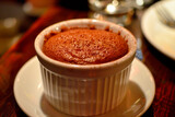 Fototapeta Góry - A freshly baked chocolate lava cake with a molten center. Chocolate cake or fondant powdered sugar on top