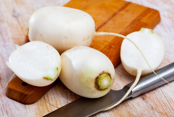 Wall Mural - Many white radish on wooden surface. High quality photo