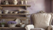 French country kitchenette, with a lavender wall, antique cream armchair, and distressed wooden shelving displaying ceramic dishes and a basket of lavender.