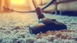 A close-up view of a vacuum cleaner being used on a carpet, emphasizing the attention to detail in home cleaning