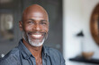 Head shot portrait happy African American man with healthy smile