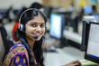 Indian call center agent wear headset work in customer support